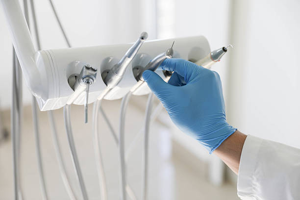 Professional Root Canal Treatment technician working in Munfordville, KY